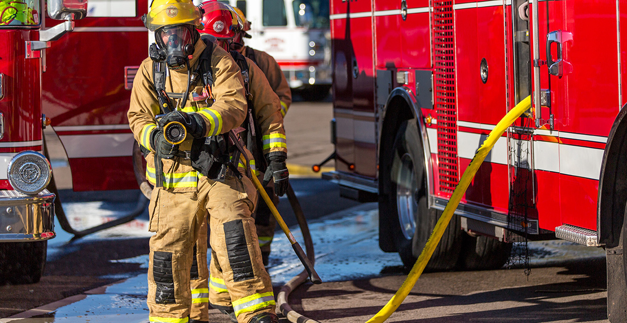 Firemen fire truck hose