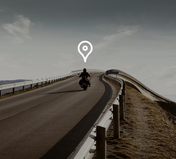 man on motorcycle with map icon above his head